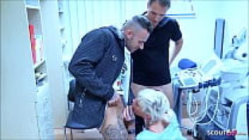 Two individuals in the clinic deceived a German MILF nurse into becoming a trio.