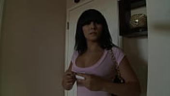 The mother, a brunette, sucking a massive cock