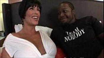 Loved by a black thug, Busty Big Tit Milf is a favorite. Video that's Interracial