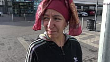 A wicked Turkish street prostitute reveals her hairy pussy to an elderly pervert.