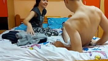 Teenage couple enjoying a harsh and brutal sexual encounter in the bedroom