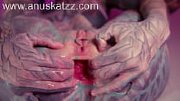 The play of BDSM, latex, anal, and prolaps