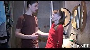 Boy sits and looks about.