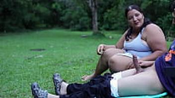 masturbation performed by a voyeur woman in the open air at a public park