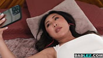 Busty Asian babe makes huge ass masturbating Chinese roommate squirt.