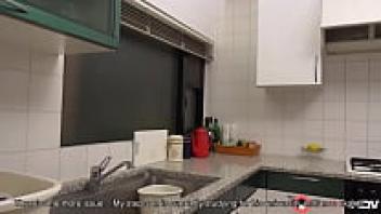 Ryouko Murakami, a Japanese brunette housewife, blowjobs her stepson's firm cock