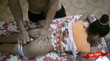 Massaging her body and stroking her stepdaughter's adorable ass with penis and items