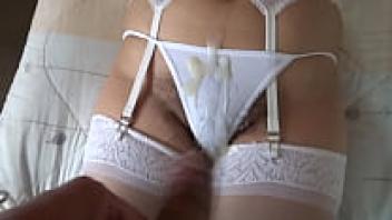 Sucking on her enormous ass, tits, face, and hairy pussy, the 58-year-old wife is getting sperm all over her body.