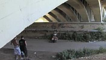 Blonde in latex bondage.