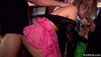 Blonde at a petrol station in bondage d.