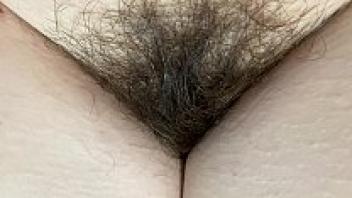 extreme close-up of my hairy fetish in a large bush in 4K HD
