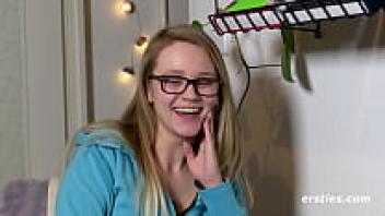 On the threshold, Nurse Holly engages in foreplay.