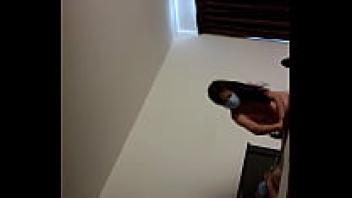 Chinese escort in a hotel wearing a mask