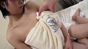 A Japanese girl with short hair gets a cum blast over her face.