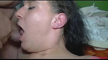 A plump brunette who adores an elderly, obese man and consumes his sperm