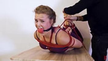For the first time, barefoot Vanda was ballgagged and hogtied.